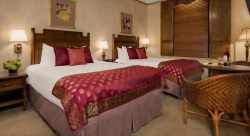 Our Premium Rooms with 2 Queen Beds are ideal for 2 traveling friends!
